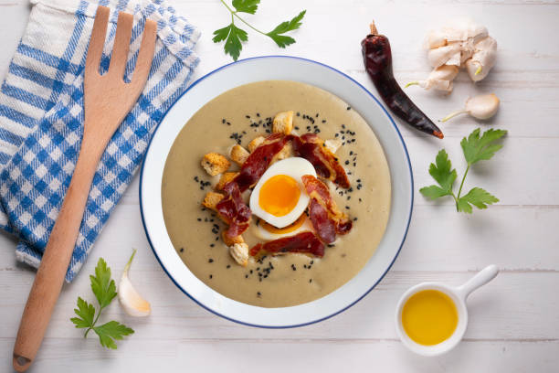 istock Smoked aubergine cream with crispy Iberian ham and boiled egg. 1431308567