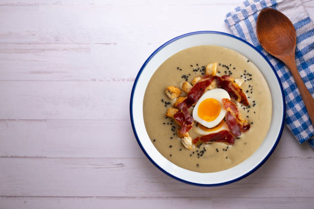 istock Smoked aubergine cream with crispy Iberian ham and boiled egg. 1431308646