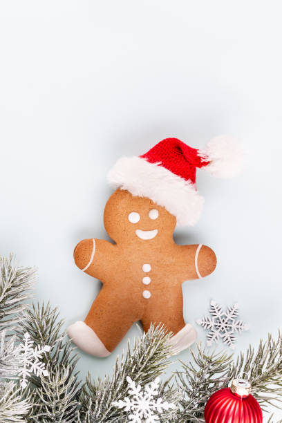 istock Gingerbread man, cookies and Christmas decor on pastel background. 1431310735