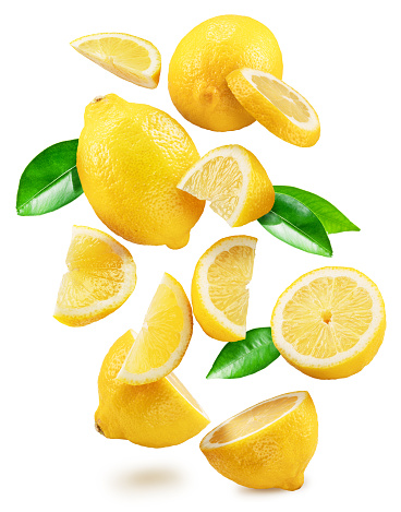 Slice of lemon isolated on white background. The perspective of the image is top view while you can see the seeds through it. It is a bright and clear image with a beautiful yellow.