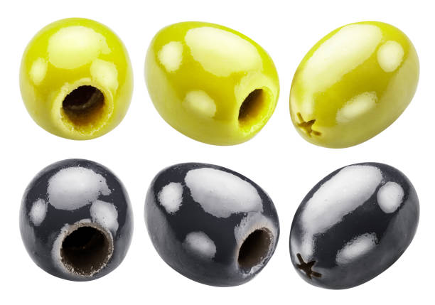 Green and black pitted olives on white background. File contains clipping paths.