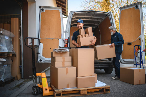istock Portrait Of Young Male Delivery Worker Unloading The Van 1431325352