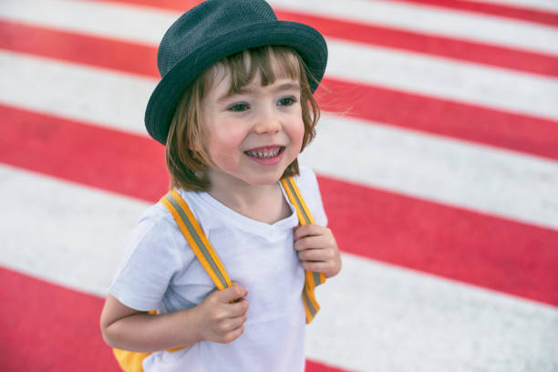 Happy little boy and crosswalk.