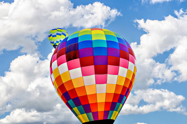 istock Hot air balloon flight over blue sky 1431333135