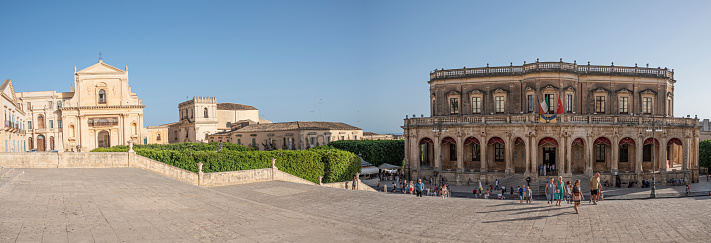 Noto, italy - 09-15-2022: Extra wide view of the Duomo Square in Noto
