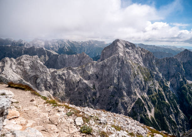 istock Panorama of rock peaks among the clouds 1431335458