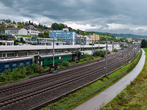 Au ZH, Switzerland - September 15.2022: The town Au ZH by Zurich lake with railway station and bike path