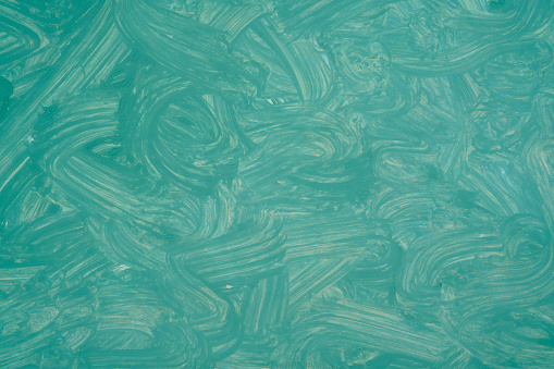 Paper texture painted in blue green