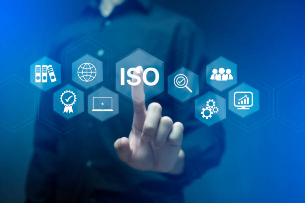 istock ISO Certification of standards quality control assurance business technology concept. Businessman touching virtual screen iso certification icon to guarantee. 1431347508