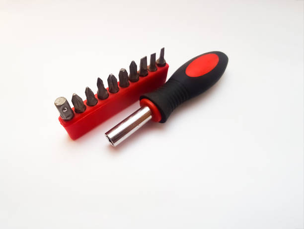 набор из нескольких типов отверток различных размеров и применений - screwdriver screw tighten fastener стоковые фото и изображения
