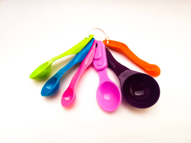 istock Set of measuring spoons for children's needs with different colors and different sizes 1431347903