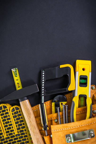 istock Tools in the bag for carpentry and accessories on a black background. 1431352191