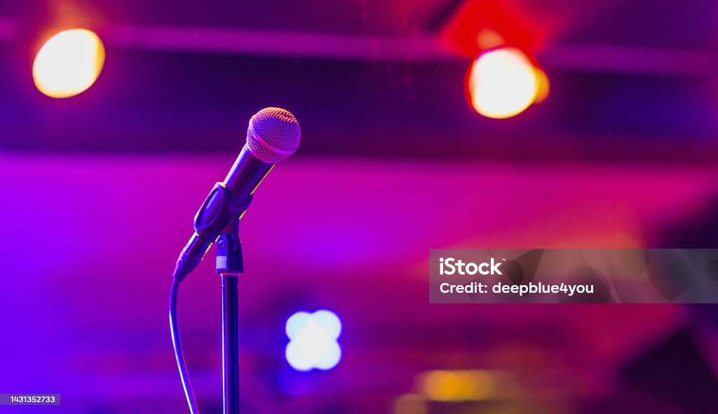 Microphone on the stage at the concert in the evening Microphone Stock Photo