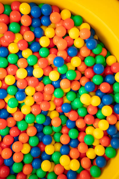 istock Background of plastic colorful balls. 1431354615