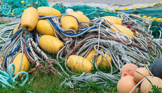 istock industrial fishing nets with bright floats is folded ashore 1431356138