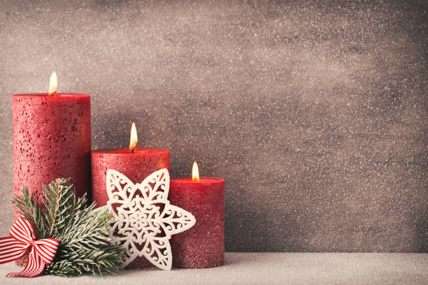 istock Christmas candles and lights. Christmas background. 1431357614