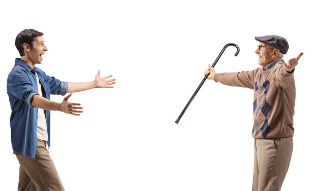 istock Happy young man walking towards an elderly man with arms wide open 1431357783