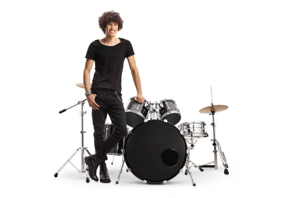 istock Young male drummer standing next to a drum kit 1431357821