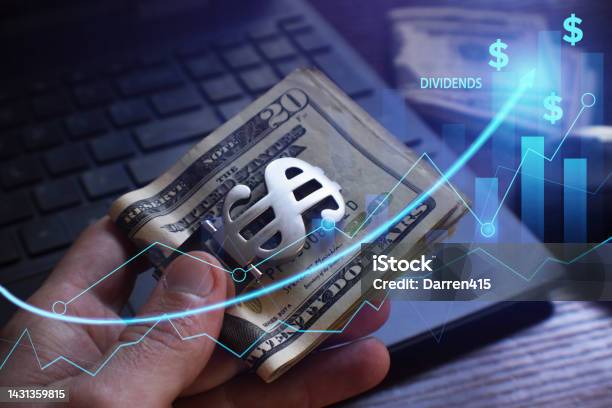 Dividend Income From Owning Shares In Companies Through The Stock Market Stock Photo - Download Image Now