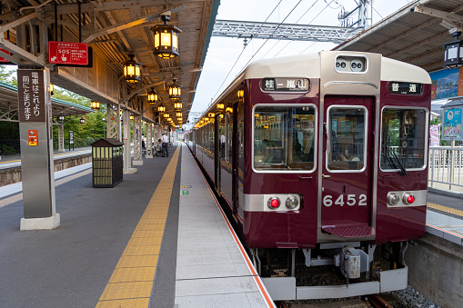 Kyoto, Japan - August 15, 2022 : Hankyu Arashiyama Line Train at the Arashiyama Station in Kyoto, Japan. It is operated by Hankyu Railway. It is the terminal station of the Hankyu Arashiyama Line.