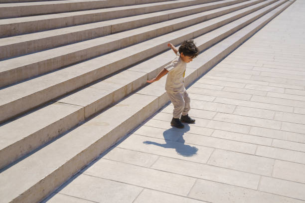 Boy tourist in Herceg Novi old town. Historical and touristic center of Herceg Novi. Montenegro.