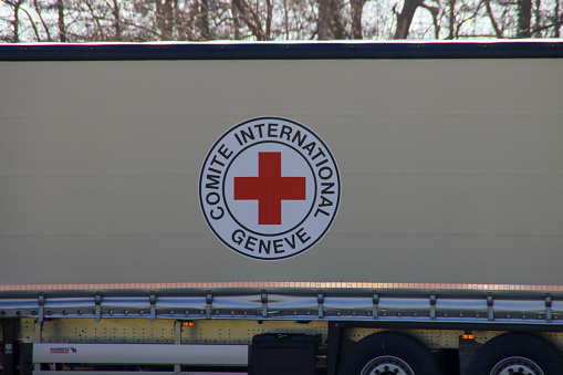 Trucks destinated for Africa to support the Red Cross organization ready for transport