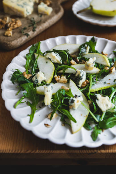 istock Healthy salad with pears, arugula, walnut and blue cheese 1431381306