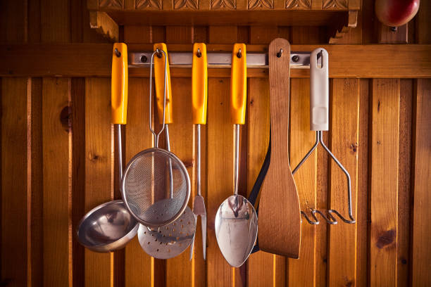istock View of different kitchen utensils hanging in kitchen 1431382757