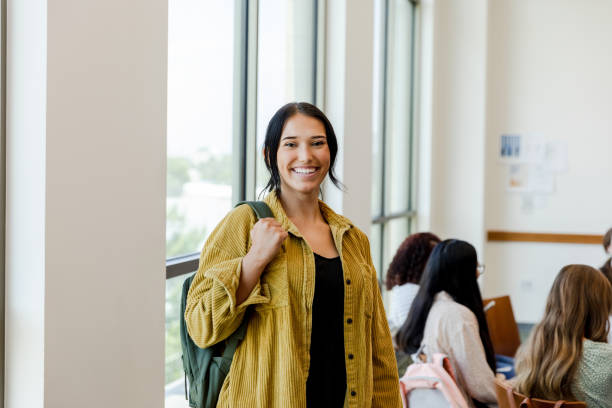 istock Smiling young woman arrives for class 1431383895