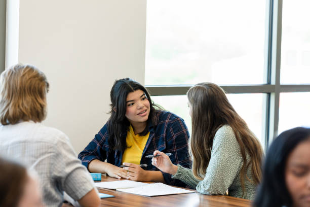 istock Teen girls have disagreement while working on homework 1431383914