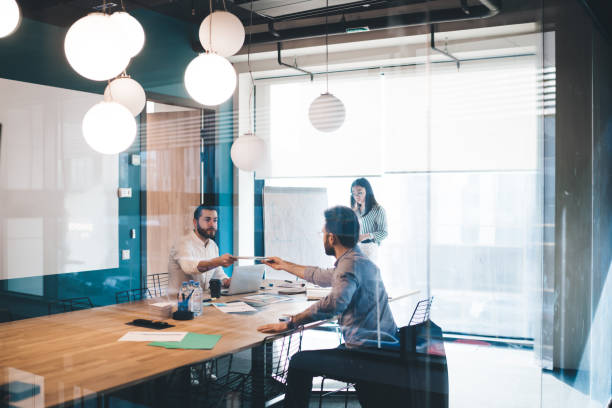 istock Office employee communicating and working together at conference room 1431384077