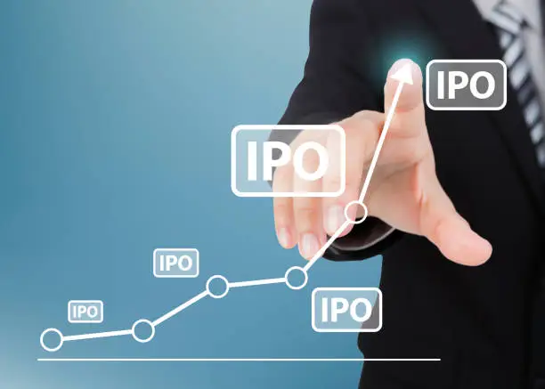 Photo of Businessman pointing hand on the transparent ipo text, trading, investment and business concept
