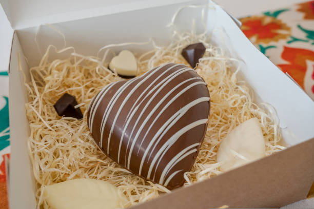 istock Heart shaped chocolate candy in a gift box. Romantic gift 1431388916