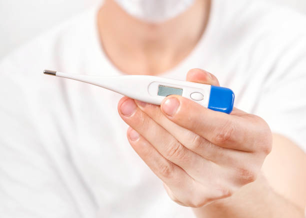 istock Man show a Thermometer 1431394095