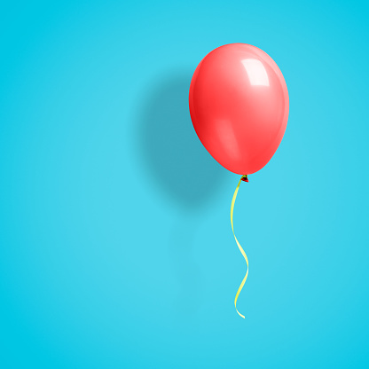 Red balloon on blue background. This file is cleaned and retouched.