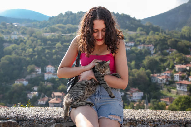 istock Cat loving girl 1431400633