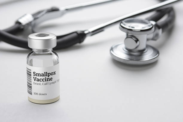 istock Smallpox vaccine in glass vial isolated on white. 1431408569