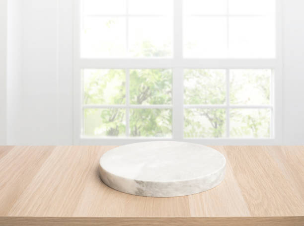 istock Selective focus.Wood table top with chopping board with blur home window 1431410459