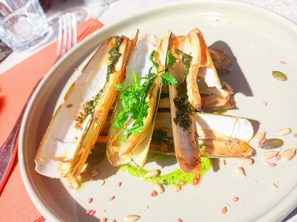 istock Photograph of cooked razor clams 1431412541