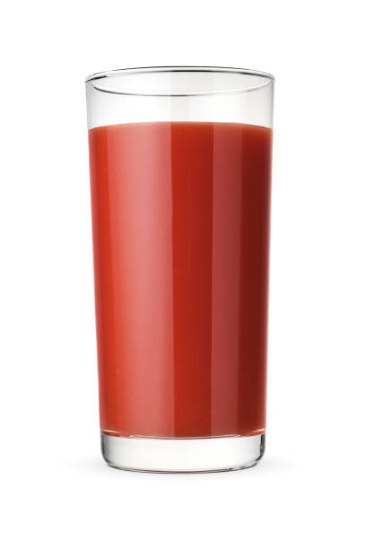 istock Tomato juice glass isolated on white. 1431412647