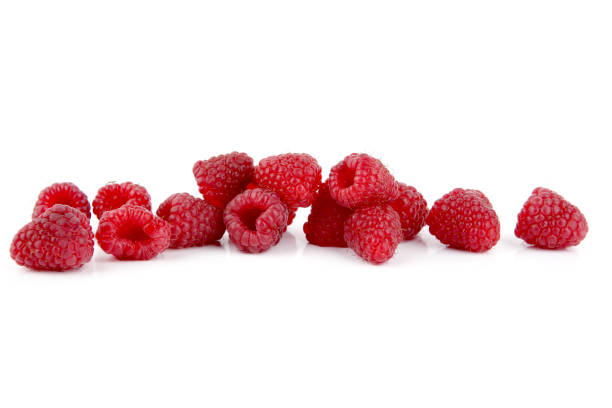 istock Pile of raspberries isolated on white background. 1431418108