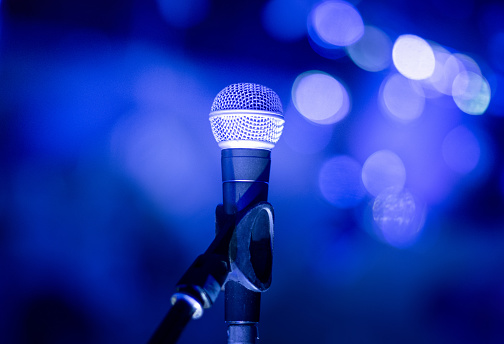 Microphone on the stage at the concert in the evening