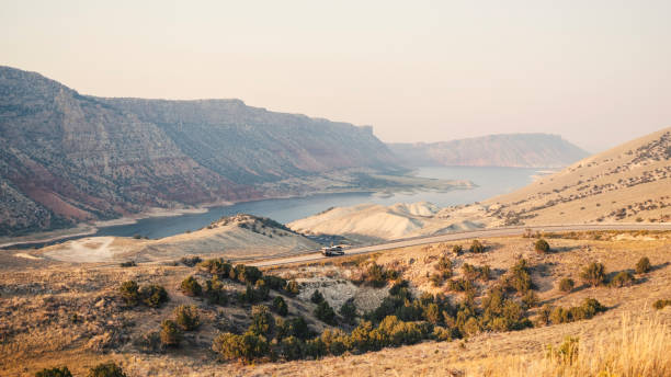 istock RV driving through southwest usa desert at sunset 1431421471