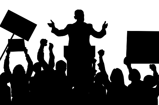 Silhouette of a speaker and protestors. Vector illustration of the concept of freedom of speech, rights to protest and liberty