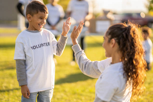 istock Volunteers High-Fiving 1431430829