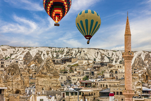Goreme cave town in Cappadocia, Turkey. Hot air balloons