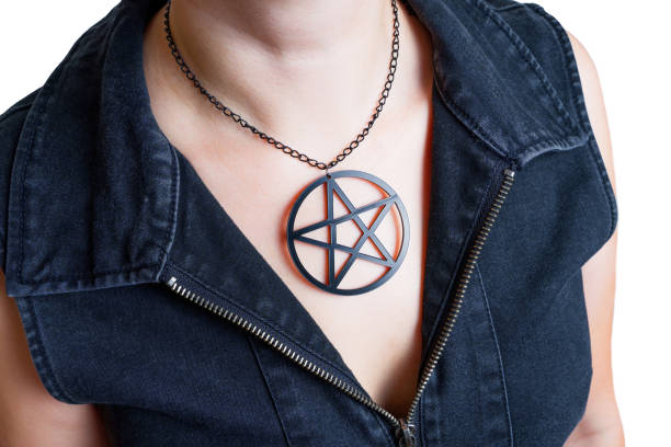 Woman wearing a large black pentagram