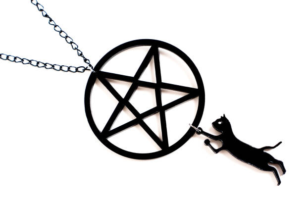 istock Pentagram and black cat necklace on white 1431431084