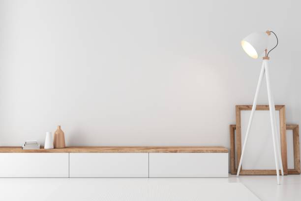istock Modern white bureau or tv console mockup in empty living room 1431433085