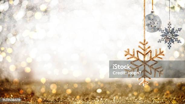 Christmas Ornaments Against Glittery Background Stock Photo - Download Image Now - Christmas, Holiday - Event, Backgrounds